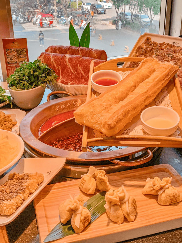 賣烤肉、進校園…...海底撈為何把這么多第一次給了西安？